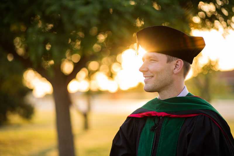 dr graduate outside dentist